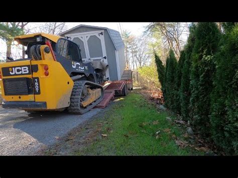 move shed with skid steer|portable buildings on skids.